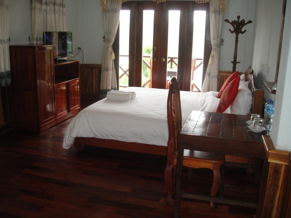 Villa Kingkham Riverside Λουάνγκ Πραμπάνγκ Δωμάτιο φωτογραφία